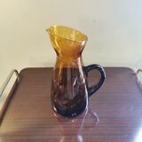 Vintage pitcher in amber glass
