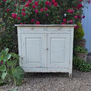 Old patinated wooden sideboard
