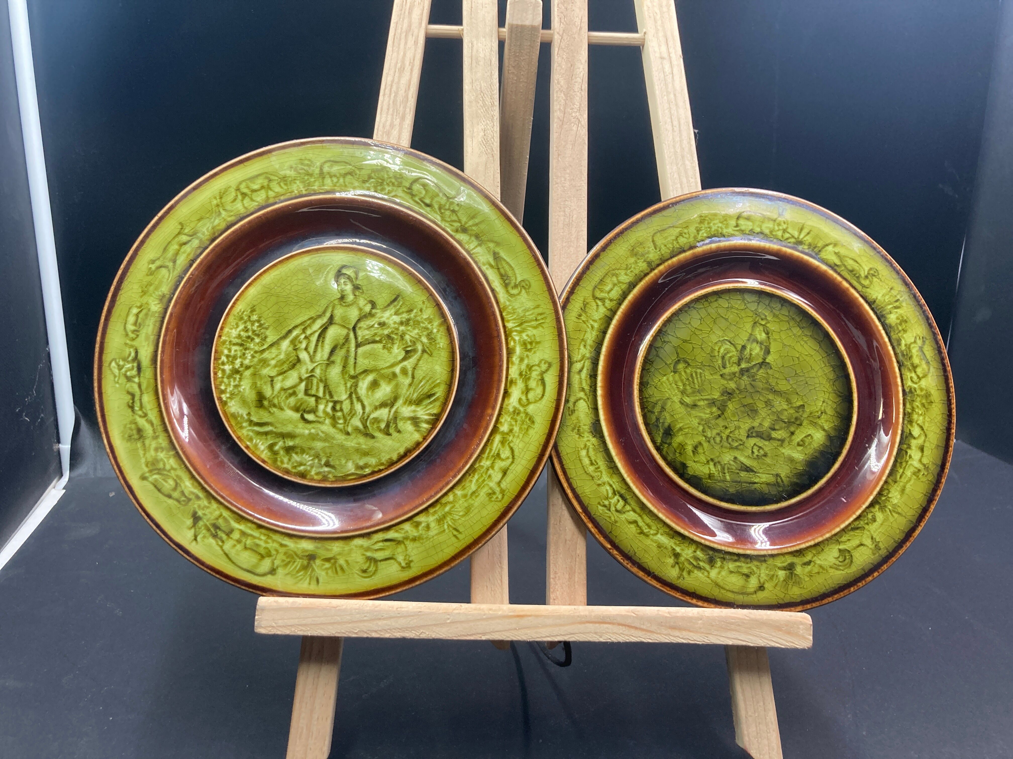 Two faience plates enamelled with choisy le roi HB & cie