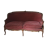 Faded pink velvet sofa