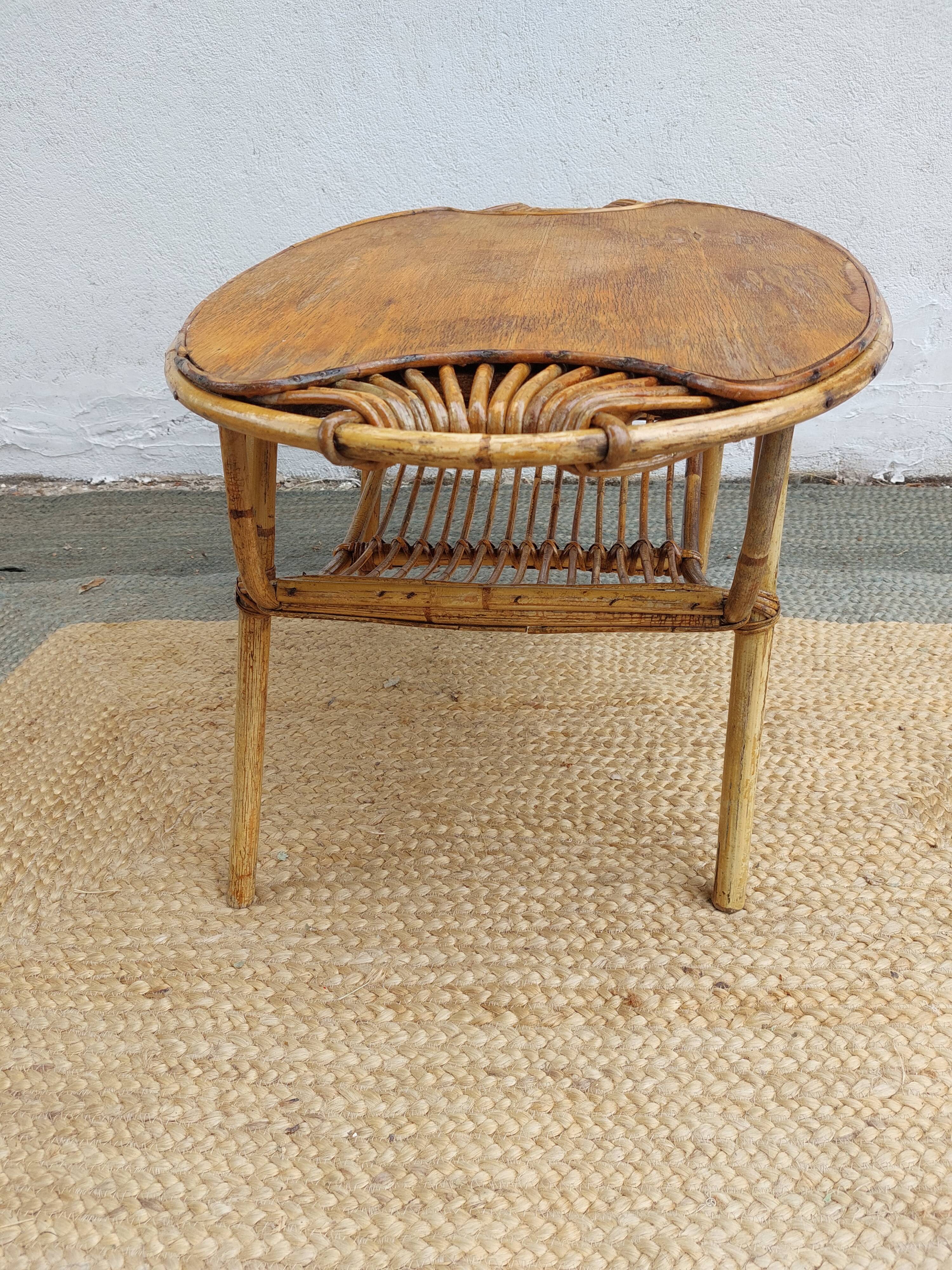 4 armchairs and a coffee table made of rattan and bamboo wood, vintage.