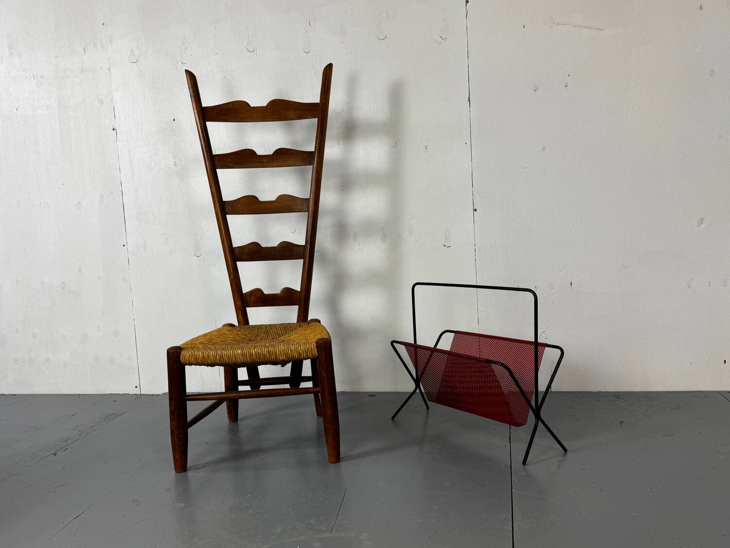 Mid-Century Modernist black and red Magazine Rack by Pilastro, 1950S