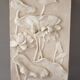 Bas-relief with flowers. Relief with flowers. Flowers in relief.