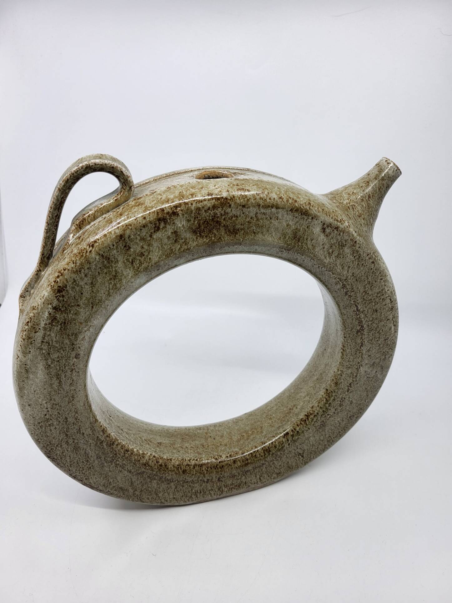 Vintage glazed stoneware pitcher in sculptural ring shape (1970s)