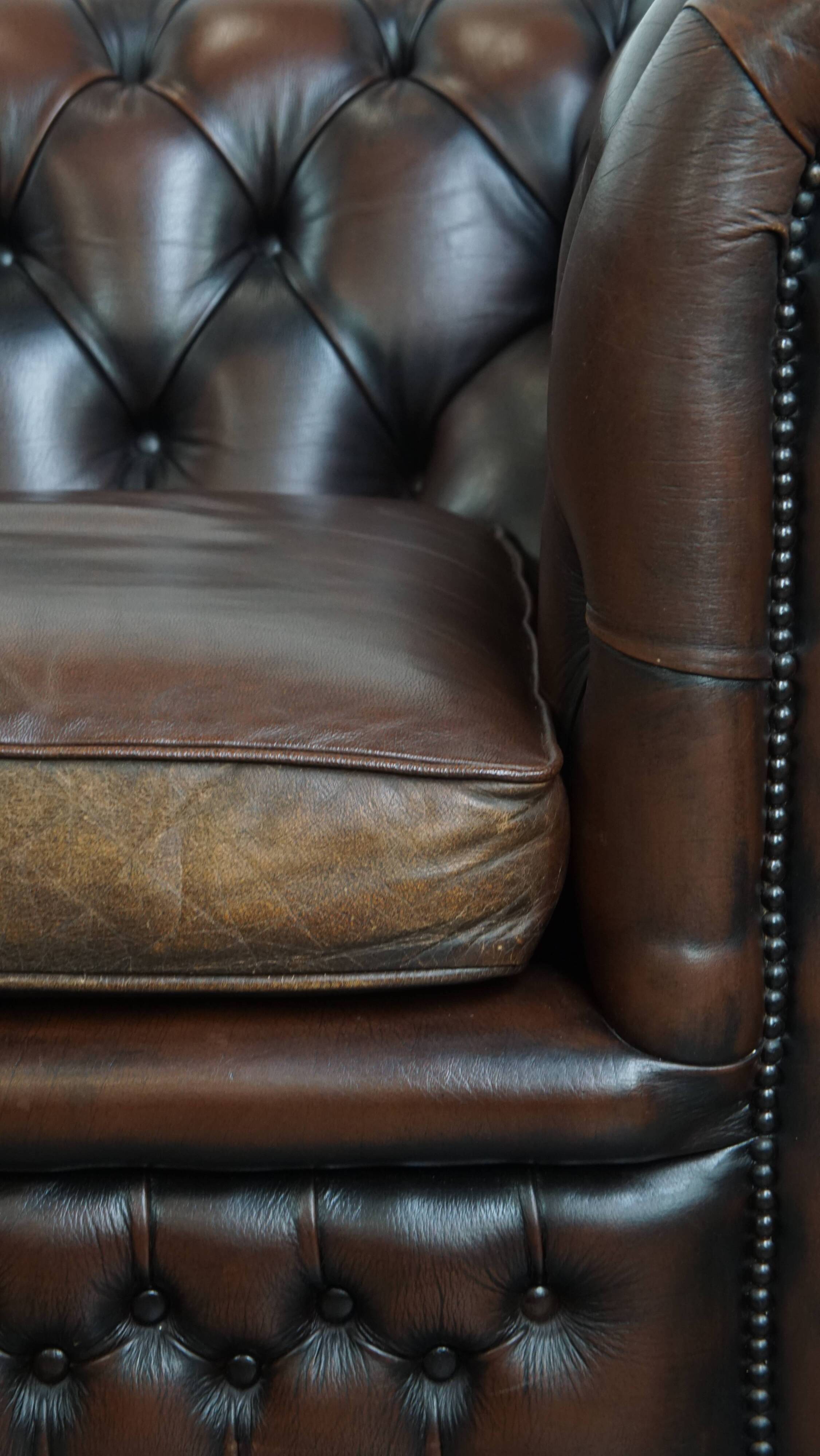 Dark brown English cowhide leather chesterfield armchair