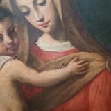 Old oil painting on canvas "Virgin Mary with Child"