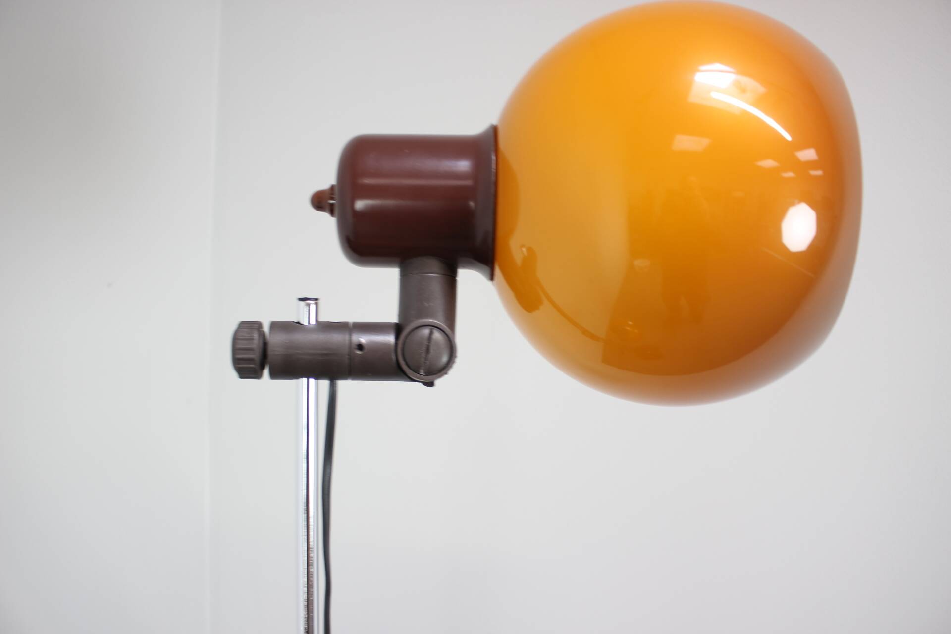 Vintage Hungarian adjustable floor lamp with two orange globe shades, circa 1970.