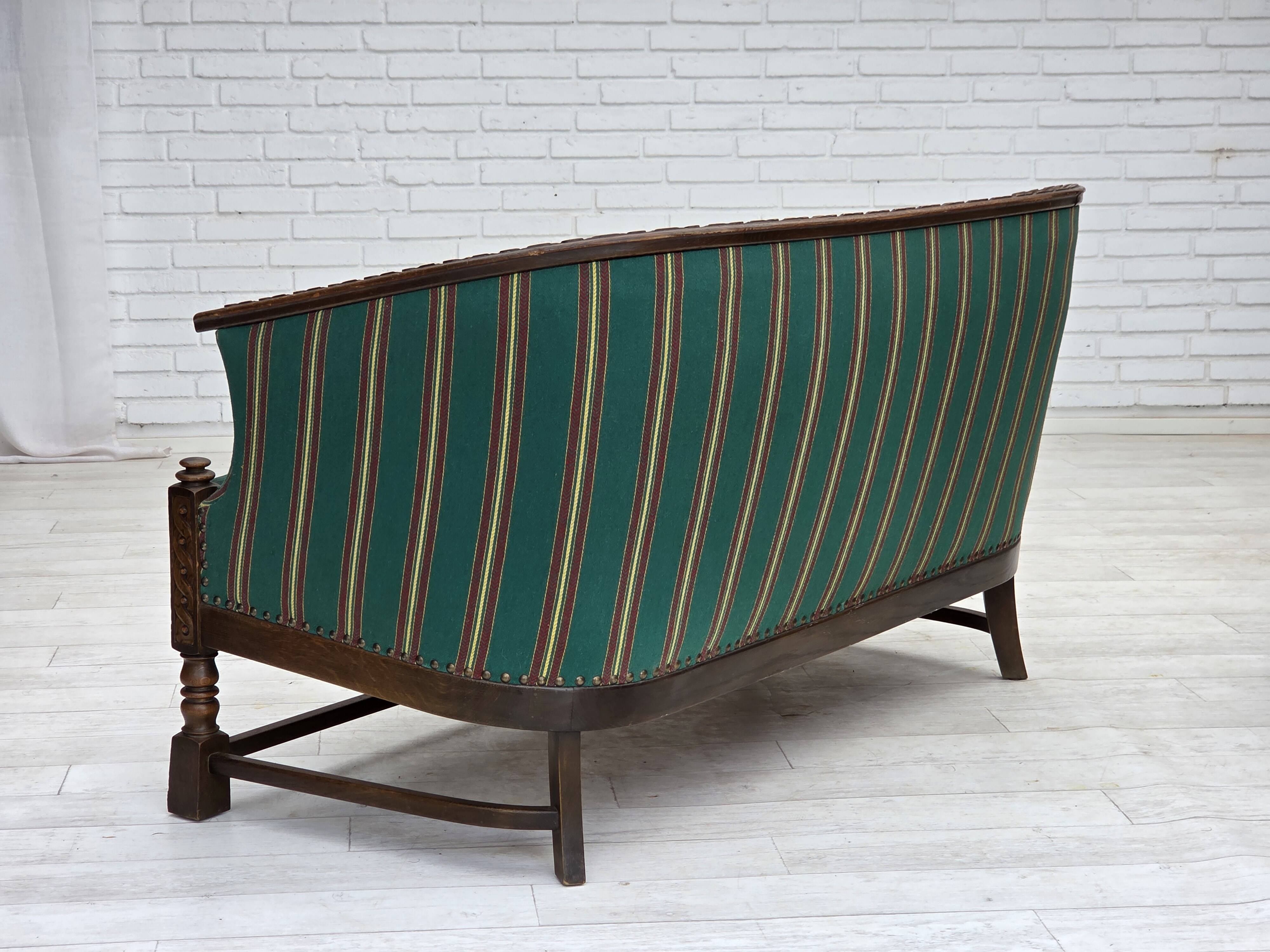 1950s, Danish 2-seater sofa, green furniture wool, oak wood.