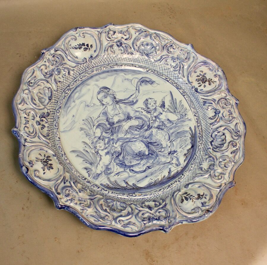 Round hollow dish in blue earthenware diameter 48 cm signed