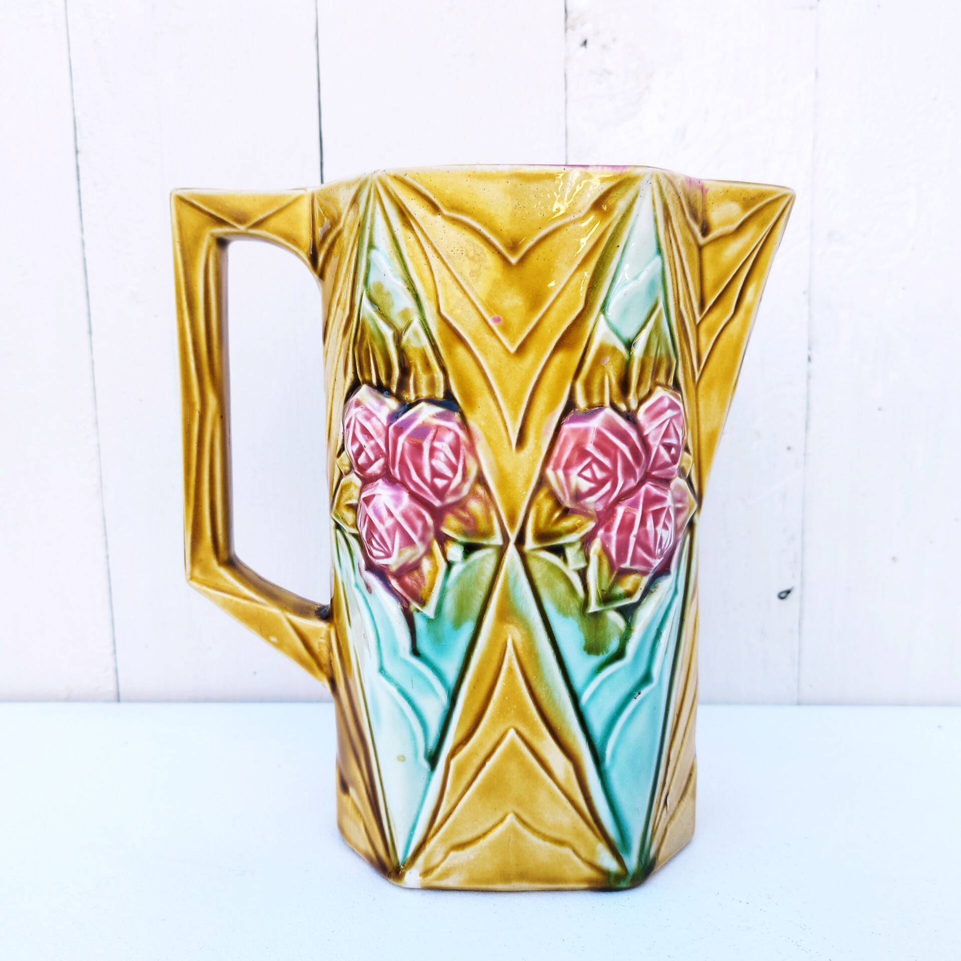 Vintage Onnaing slip rose pitcher