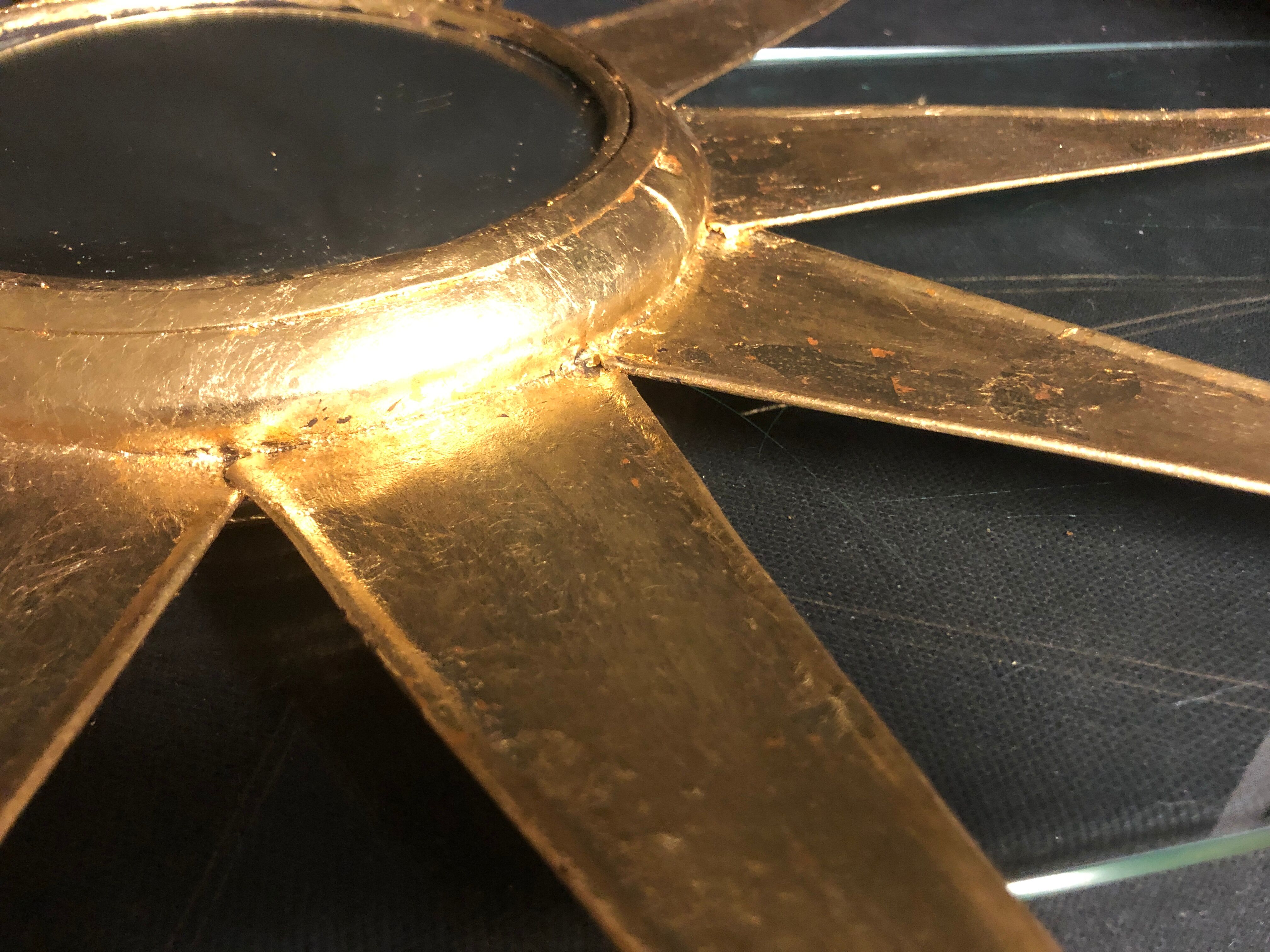 Mirror sun deforming 61 cm in gold metal with gold leaf said witch