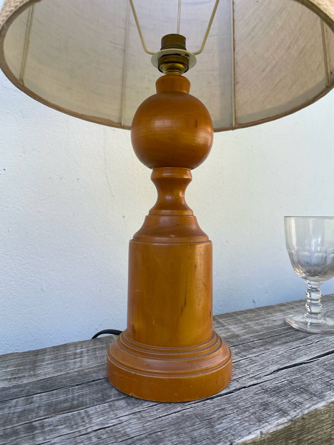 Old turned wooden lamp