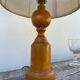 Old turned wooden lamp
