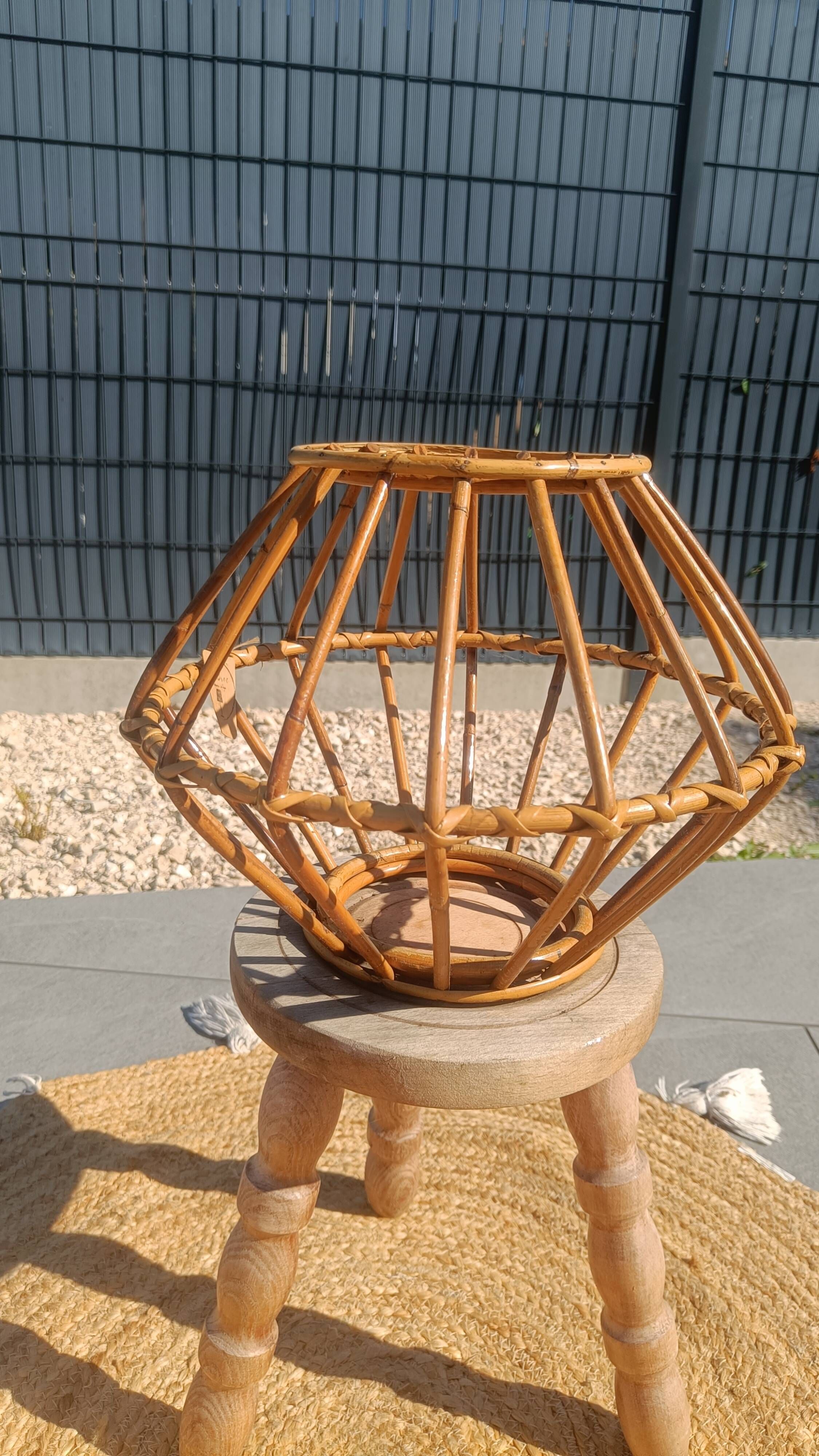 Vintage rattan and bamboo pendant light with removable shade.