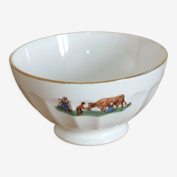 Vintage bowl decorated with cow and farmers