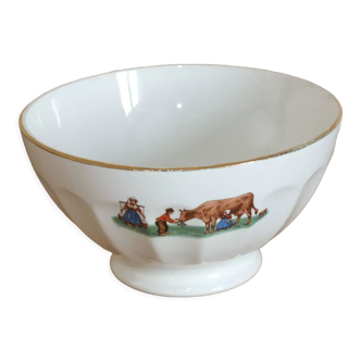 Vintage bowl decorated with cow and farmers