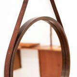 Round mirror in walnut