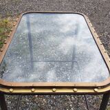 Table avec ancien hublot de bateau en  laiton avec piètement en fer / 110 X 70 X 76 cm