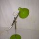 Green desk lamp with an arm from the 1970s.