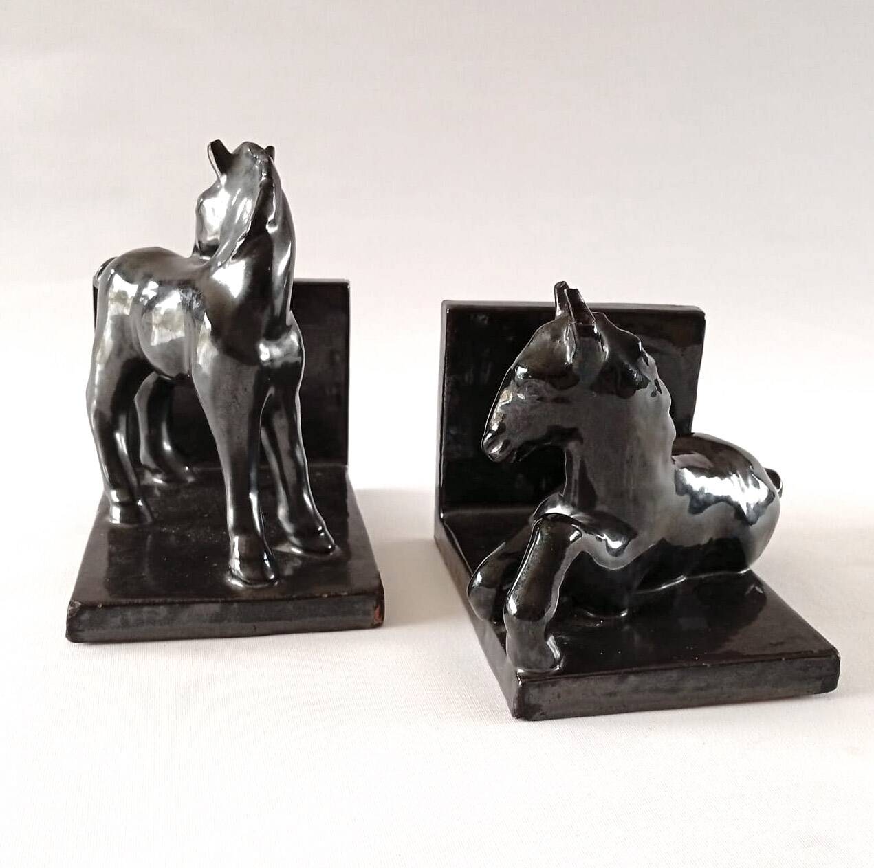 Black ceramic bookends horses
