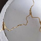 Kintsugi-inspired concrete and gold leaf cup