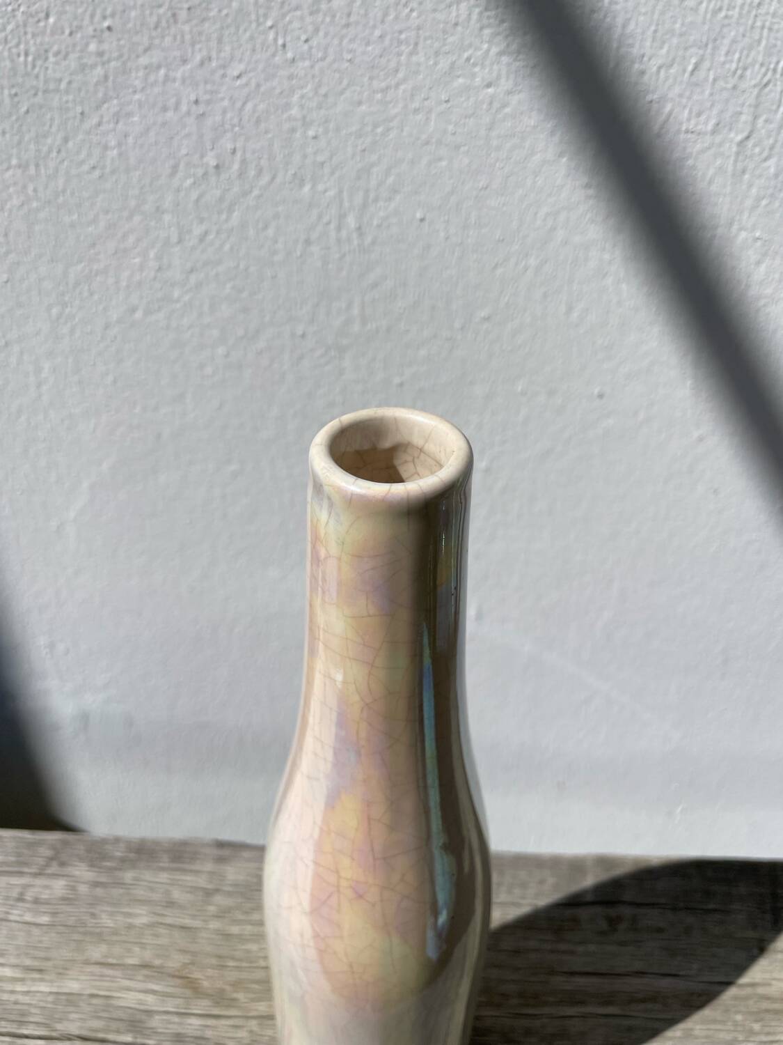 Iridescent white ceramic vase