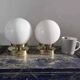 Paire d’appliques globes en opaline blanche