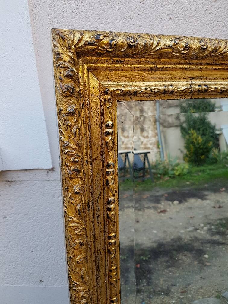 Grand golden mirror in louis xvi style