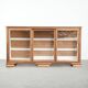 Large antique display cabinet made of oak and equipped with shelves