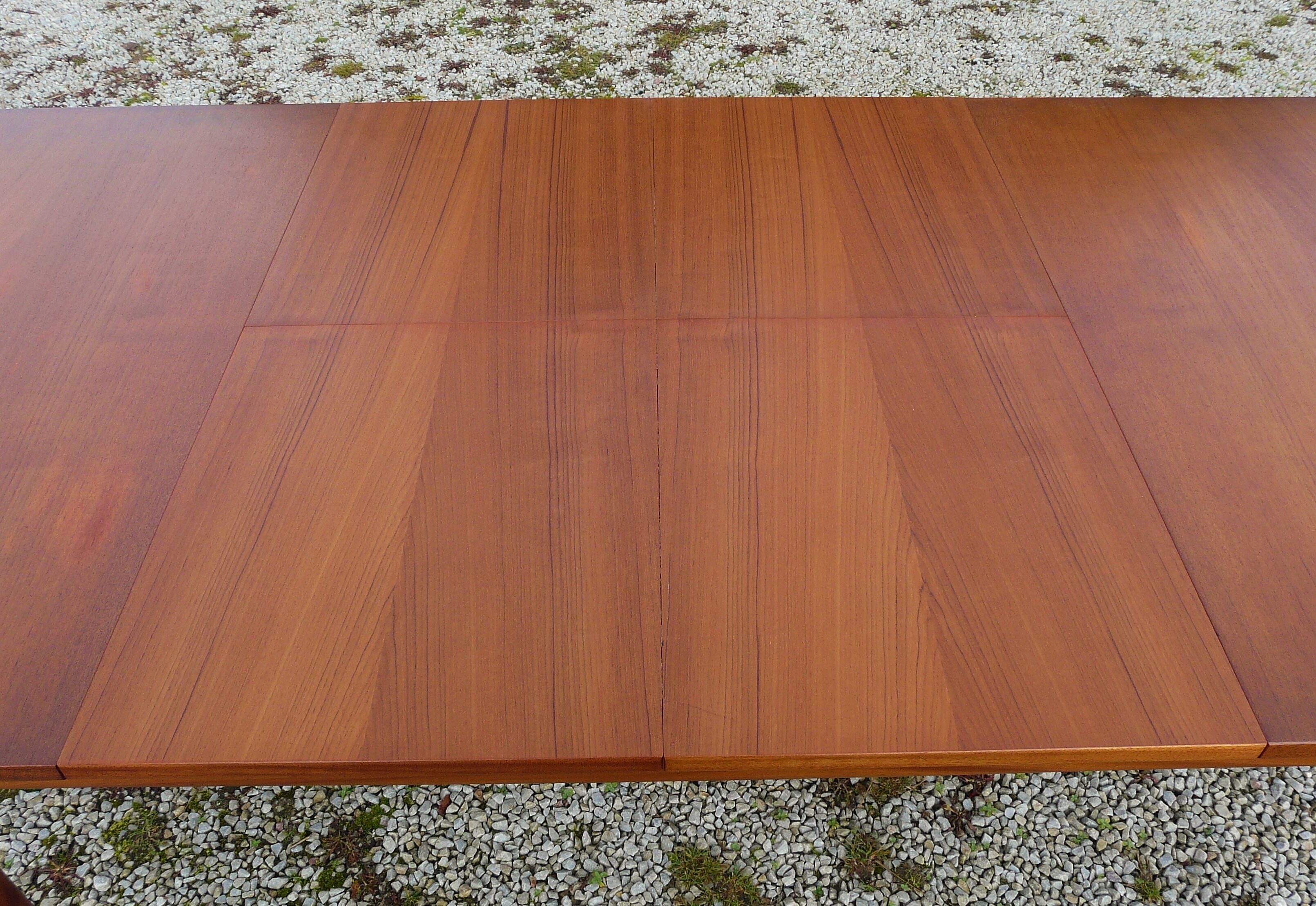 Extendable table set and six Scandinavian Teak Mc Intosh chairs