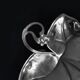 Leaf-shaped pocket tray in minimalist silver plating.