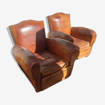Pair of club chairs with mustaches in havana leather in their juices circa 1930
