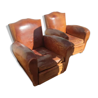 Pair of club chairs with mustaches in havana leather in their juices circa 1930