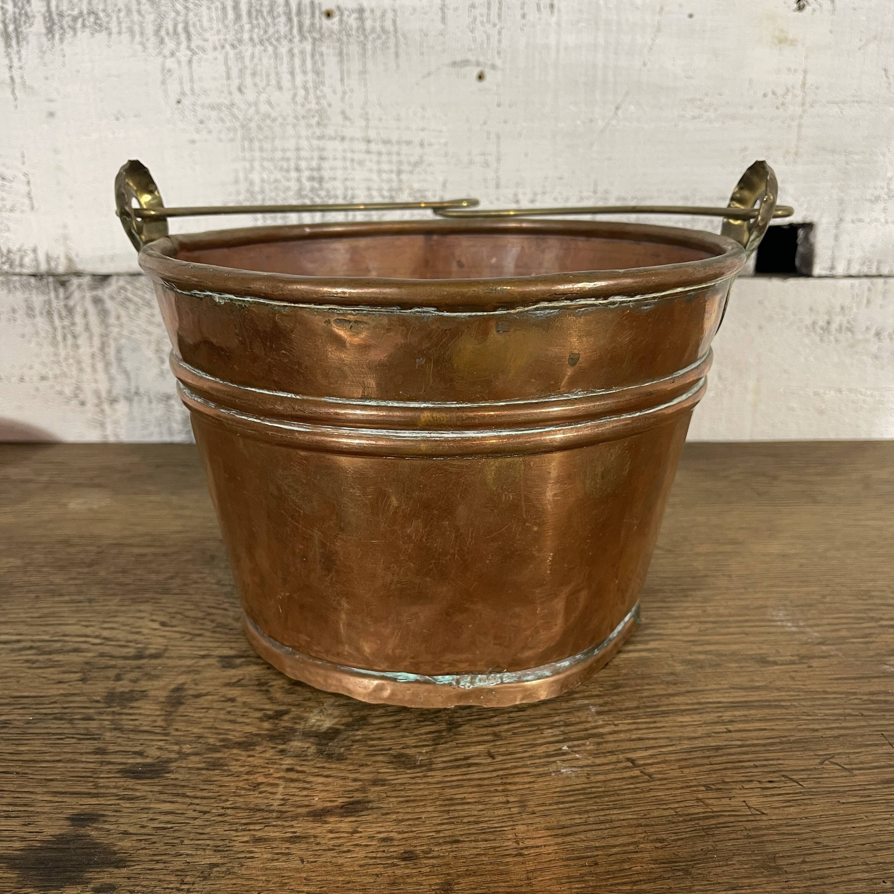 Old copper flower pot