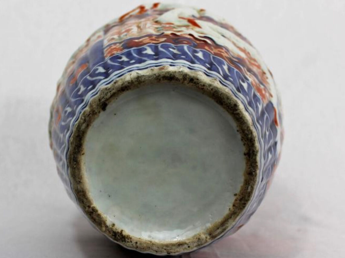 19th century Imari porcelain baluster vase with dragon relief decoration