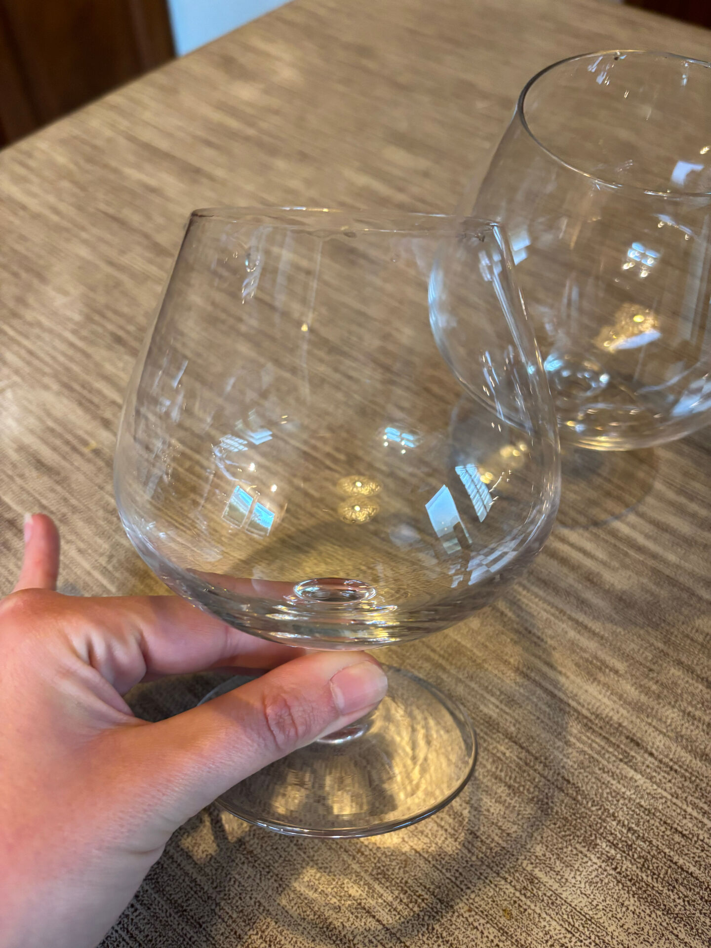 Set of two antique brandy glasses.