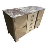 Raw wood chest of drawers with marble top