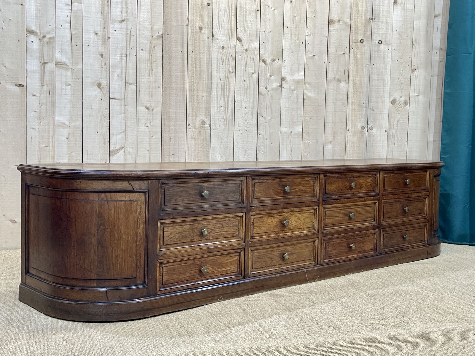 Long low oak countertop with 12 drawers - early XXth