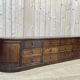 Long low oak countertop with 12 drawers - early XXth