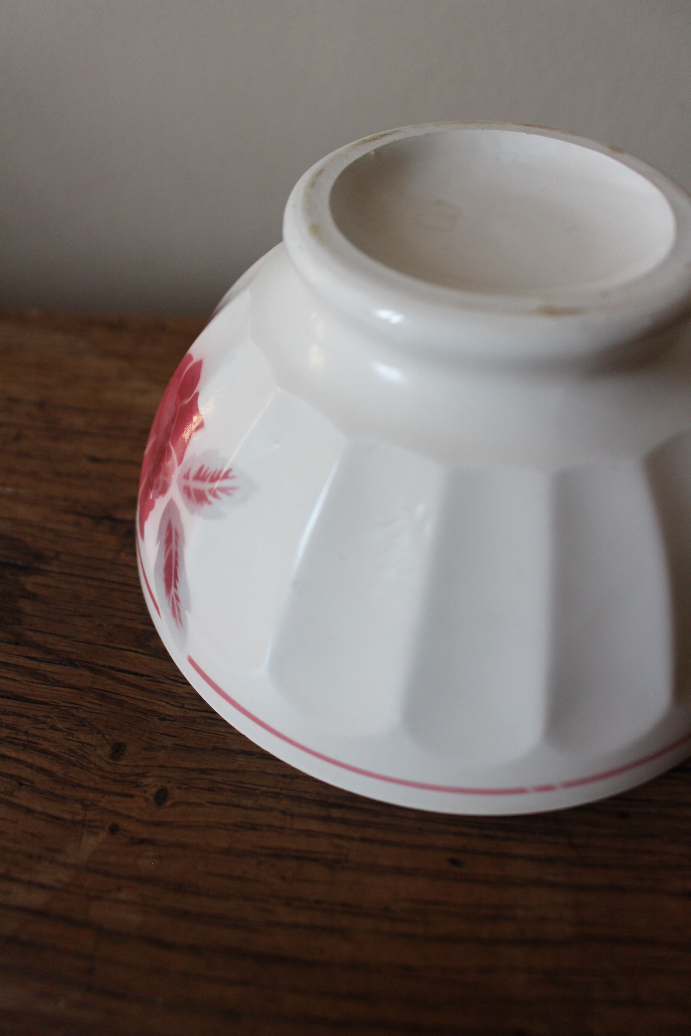 Old standing bowl pink red blue foliage