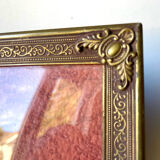 Metal frame in gold colored brass
