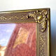 Metal frame in gold colored brass