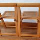 Pair of canned folding chairs.