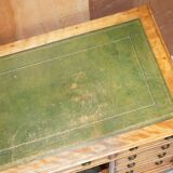 Antique desk by James Winter & Sons London in satin wood and leather.