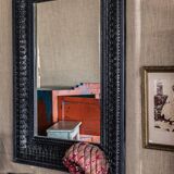 Black carved wooden mirror