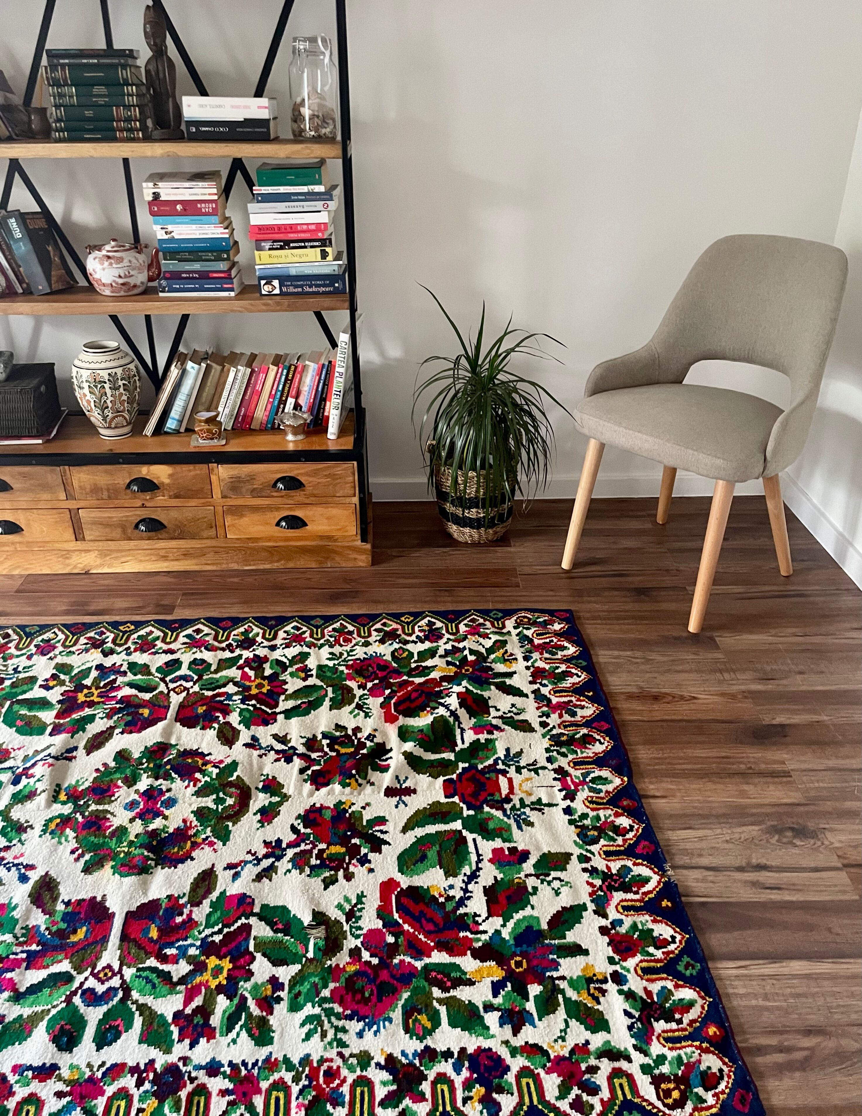 White vintage floral rug made by hand in Romania, beautiful flowers