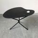 Side table in black lacquered metal, circa 1950.