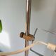 Chrome and white metal floor lamp, circa 1970.