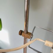 Chrome and white metal floor lamp, circa 1970.
