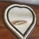 Heart-shaped bone and brass mirror